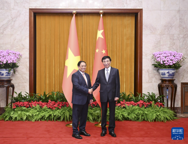 王沪宁会见越南总理范明政